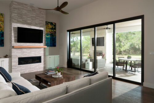 A black Renewal by Andersen sliding glass patio door